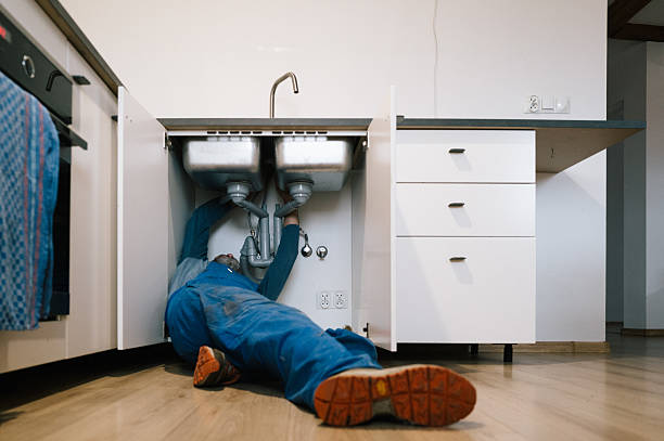 Professional Emergency Plumber technician working in Junction City, OR
